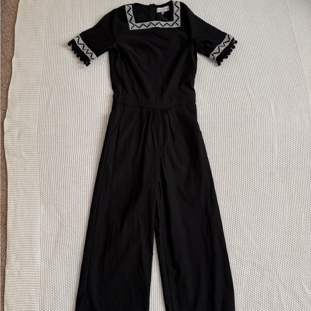 Elegant Black Jumpsuit with Embroidered Sleeves